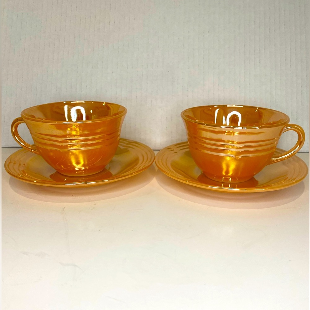 Vtg Pair of Fire King Teacups and Saucers Peach Iridescent Lustreware